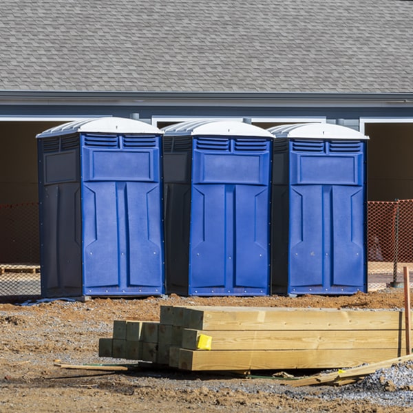 what is the cost difference between standard and deluxe portable toilet rentals in Belford NJ